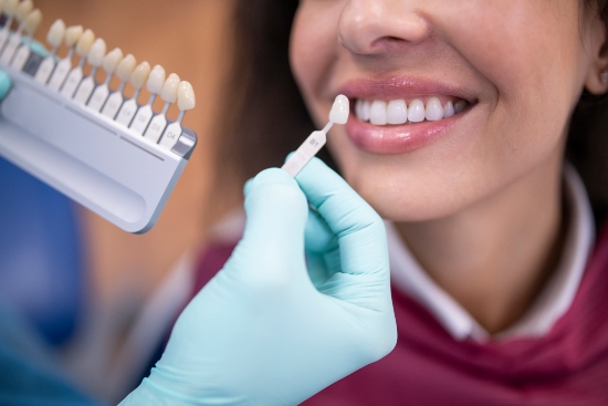 Woman receiving tooth extraction with gentle dental removal and oral care in Santa Barbara, CA