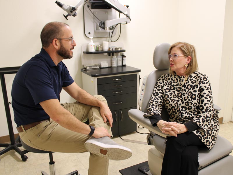Dr. Acevedo talking to patient