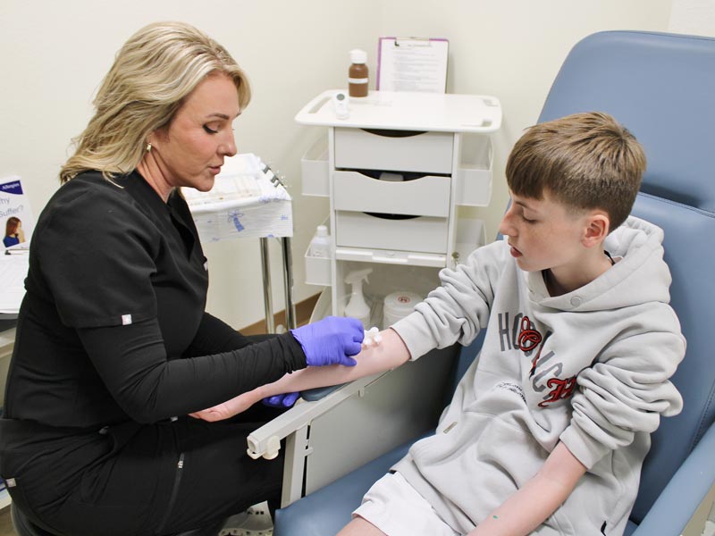 doctor doing allergy test on child