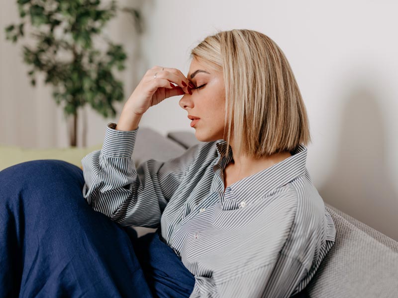 woman with sinus pain